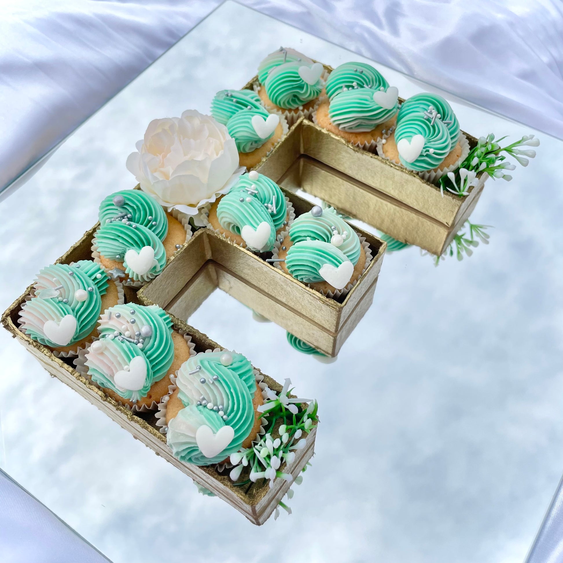 E filled letter cupcake